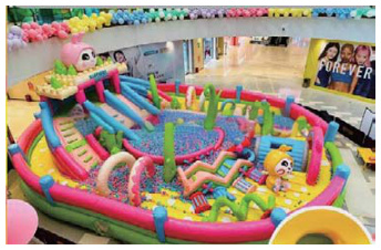 Inflatable castle in the mall atrium | Custom Leisure Inflatables | HAFE